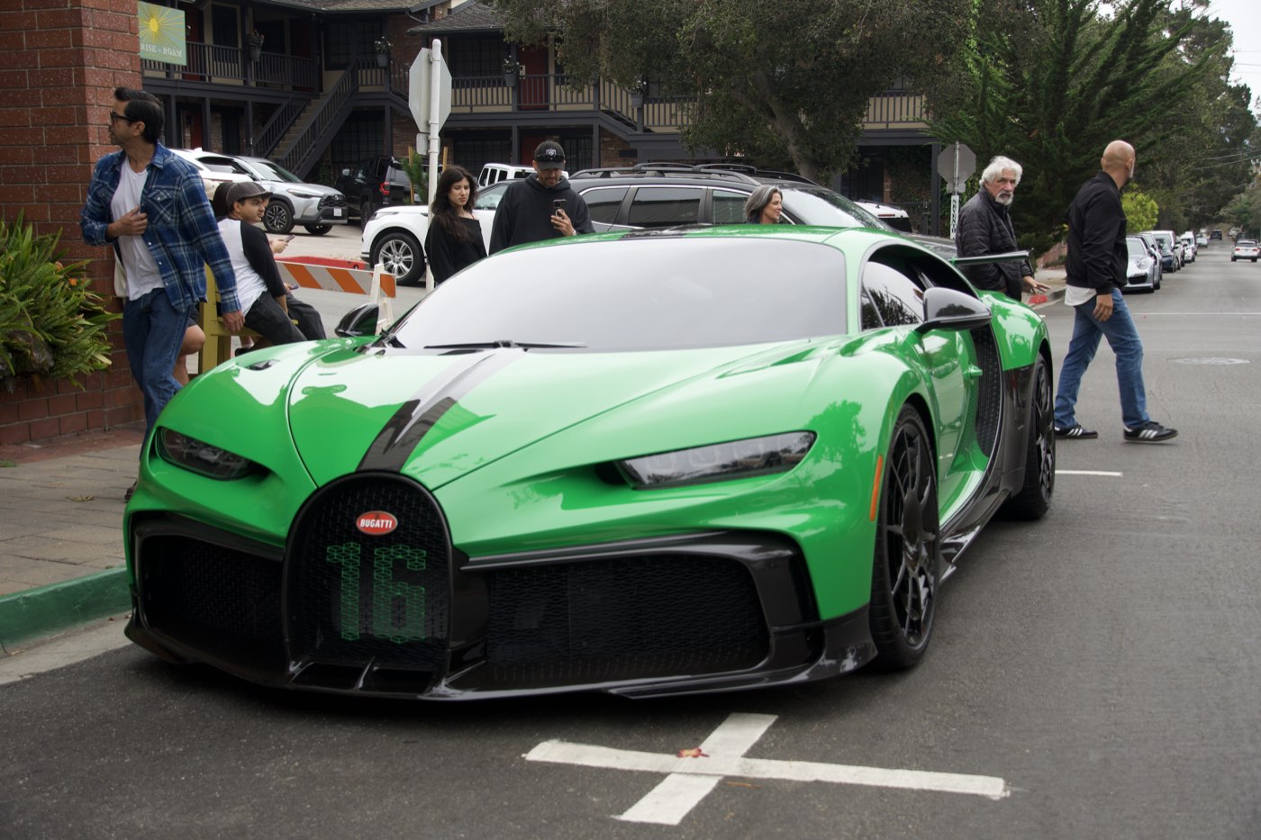A bright green Bugatti Chiron Pur Sport parked on a street in Carmel-by-the-Sea